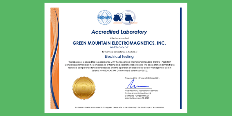 A certificate for Electical Testing is positioned in front of a green background
